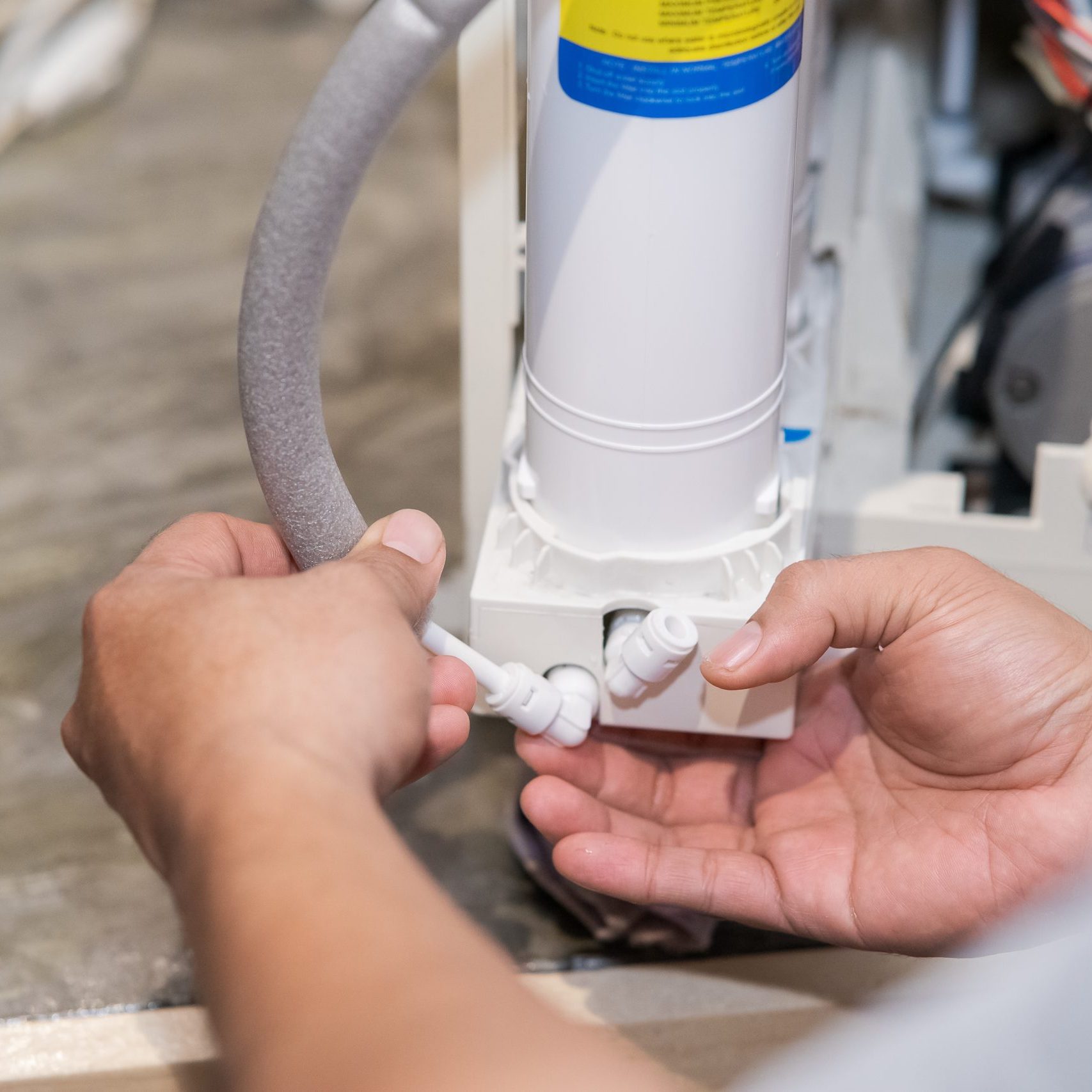 Kuala Lumpur, Malaysia - July 10, 2021 Changing water filter at home.